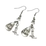 PAR ARETES VAQUEROS DE METAL SOMBRERO BOTA Y ESTRELLA