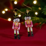 Aretes navideños cascanueces rosa