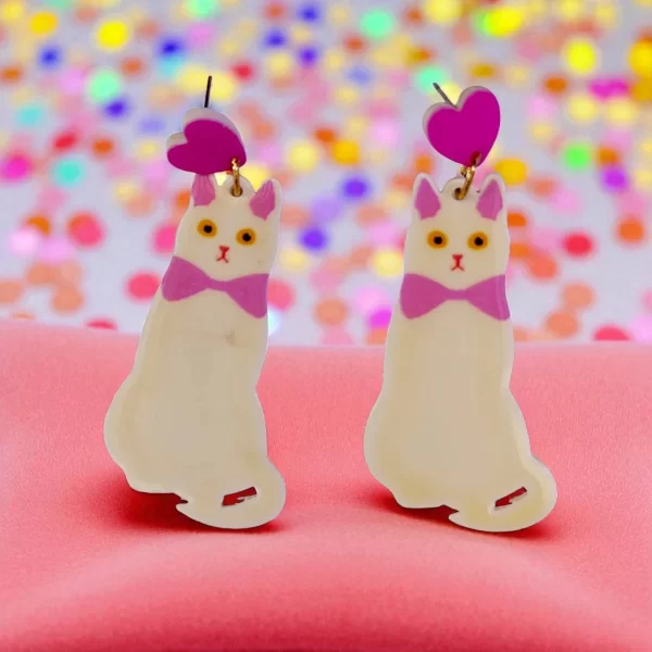 aretes gato blanco con moño rosa