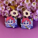 Aretes niña cabello rosa