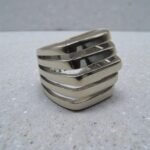 anillos acero inoxidable rejillas plateadas