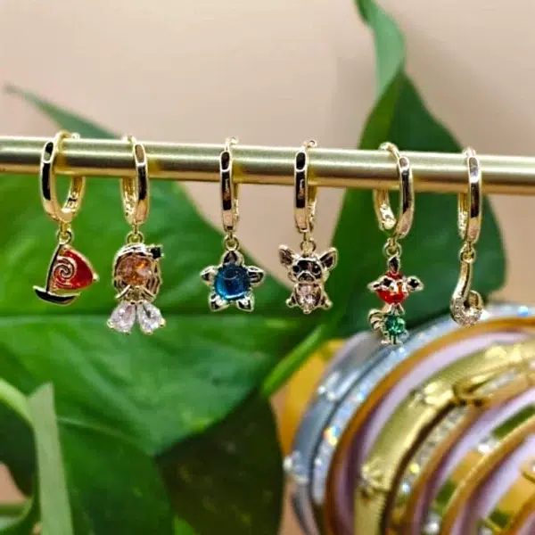 MULTI ARETES HUGGIES CHARMS DE PERSONAJES PRINCESA DE LA ISLA