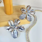ARETES DE ACERO INOXIDABLE ARETES DE FLOR PLATEADAS