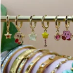 Multi aretes Higgies de charms de personajes videojuego bola rosa 