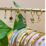 Multi aretes Higgies de charms de personajes Princesa Sapo