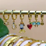 Multi aretes Higgies de charms de personajes princesa Manzana enanos