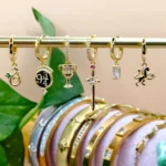Multi aretes Higgies de charms de personajes casa de magos 9 3/4