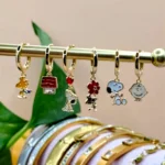 Multi aretes Higgies de charms de personajes perro