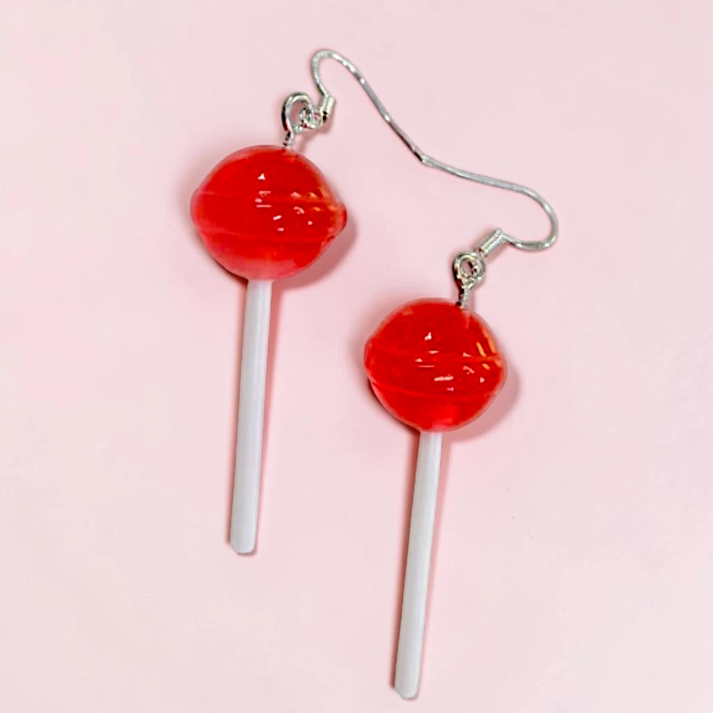 WhatsApp Image 2026-06-10 at 11.50.00 AM (4) (1) aretes locos de paletas redondas rojas - Image 1
