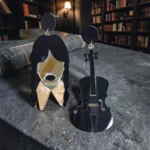 aretes de terror niña de trenzas y violín