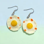 aretes locos de huevo estrellado