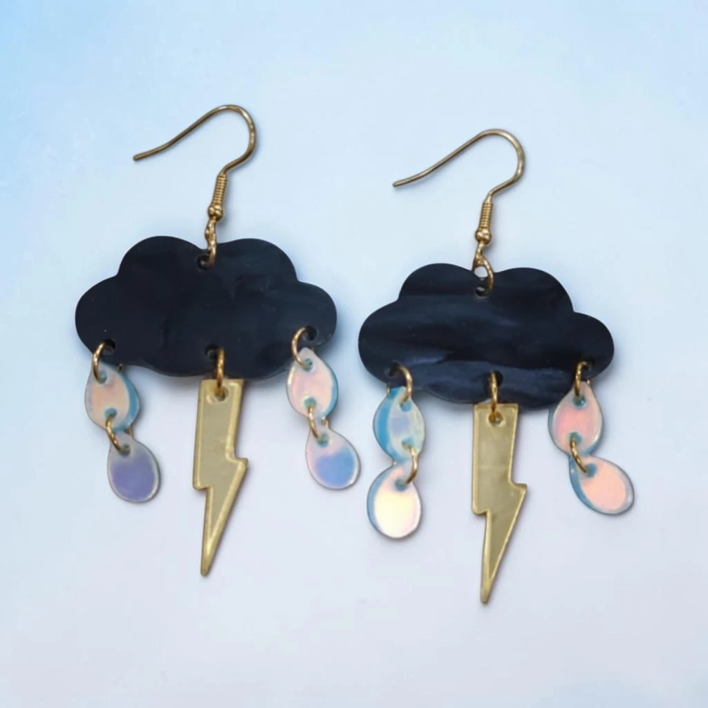 WhatsApp Image 2026-06-10 at 11.50.05 AM (2) aretes de nube negra con truenos - Image 1