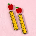 aretes de regla y manzana