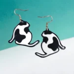 aretes de gato blanco con negro