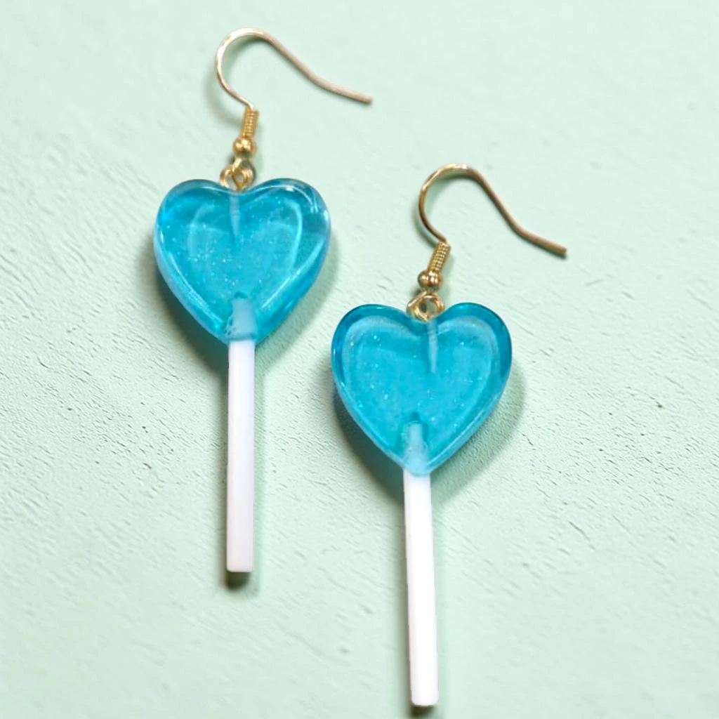 WhatsApp Image 2026-06-10 at 11.50.12 AM aretes de paleta de corazón azul - Image 1