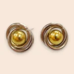 aretes de acero inoxidable tipo broquel bicolor