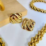 ARETES DE ACERO INOXIDABLE CUADRADOS ONDAS DORADAS