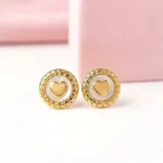 aretes de acero inoxidable redondos con corazón