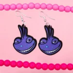 ARETES DE MDF MONSTRUO MORADO LAGARTIJA