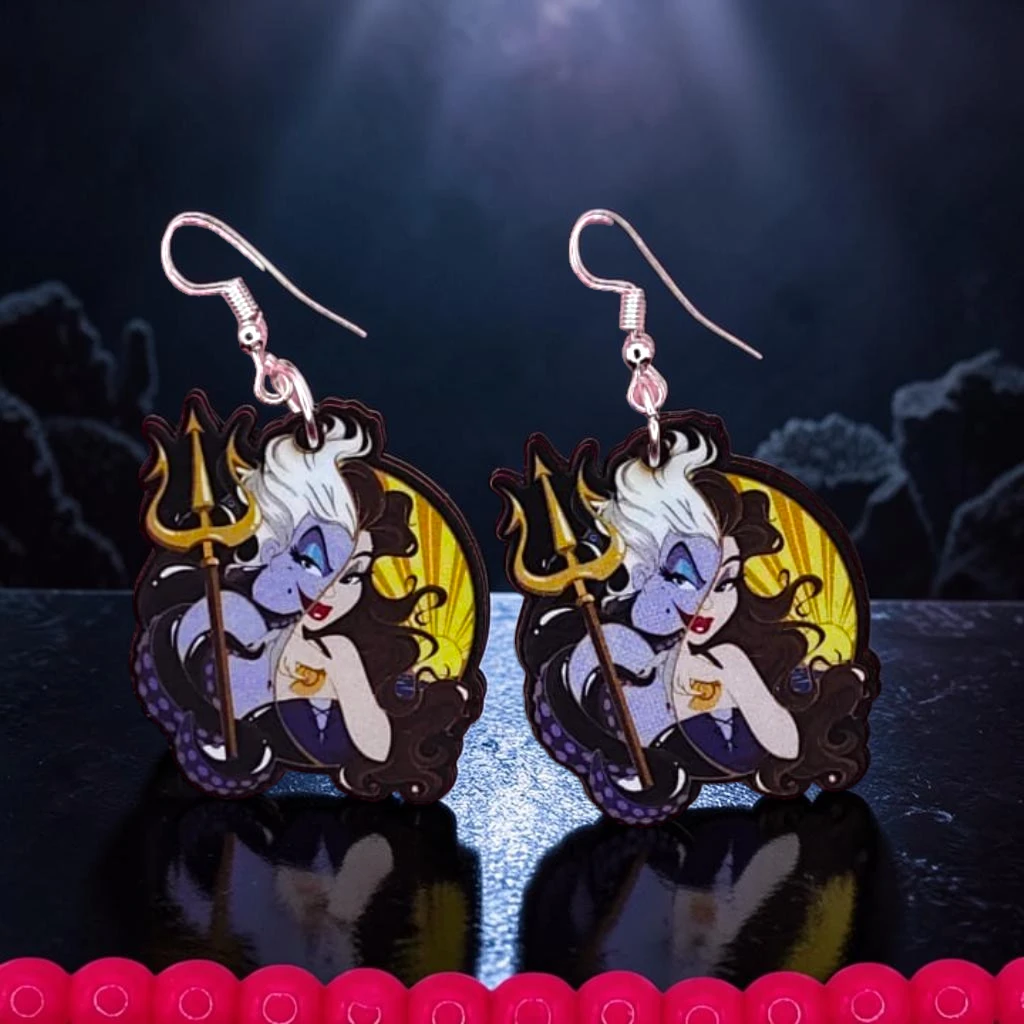WhatsApp Image 2026-07-01 at 1.42.05 PM (2) ARETES DE MDF VILLANA MITAD HUMANA - Imagen 1