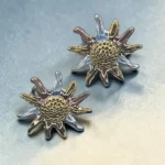 aretes de acero inoxidable tricolor sol