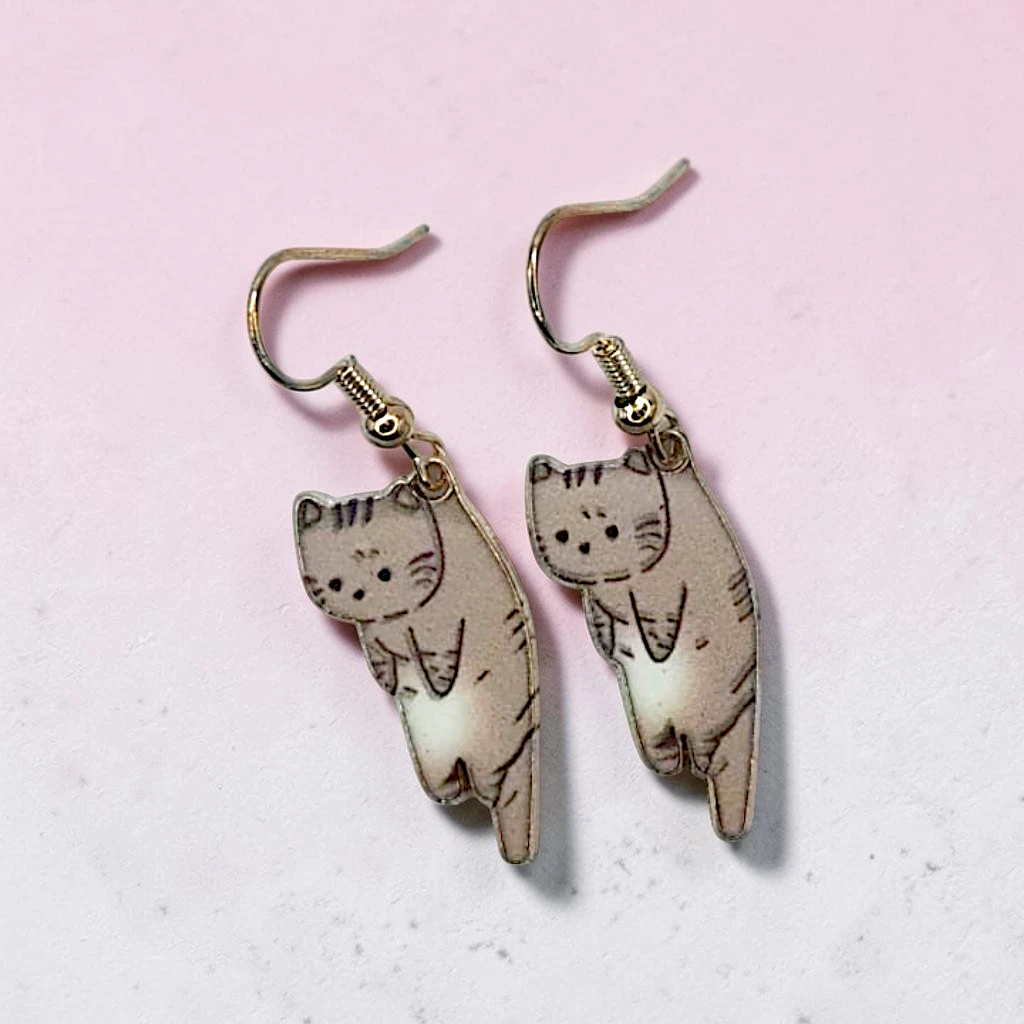WhatsApp Image 2026-07-09 at 1.56.58 PM aretes de gato café - Image 1