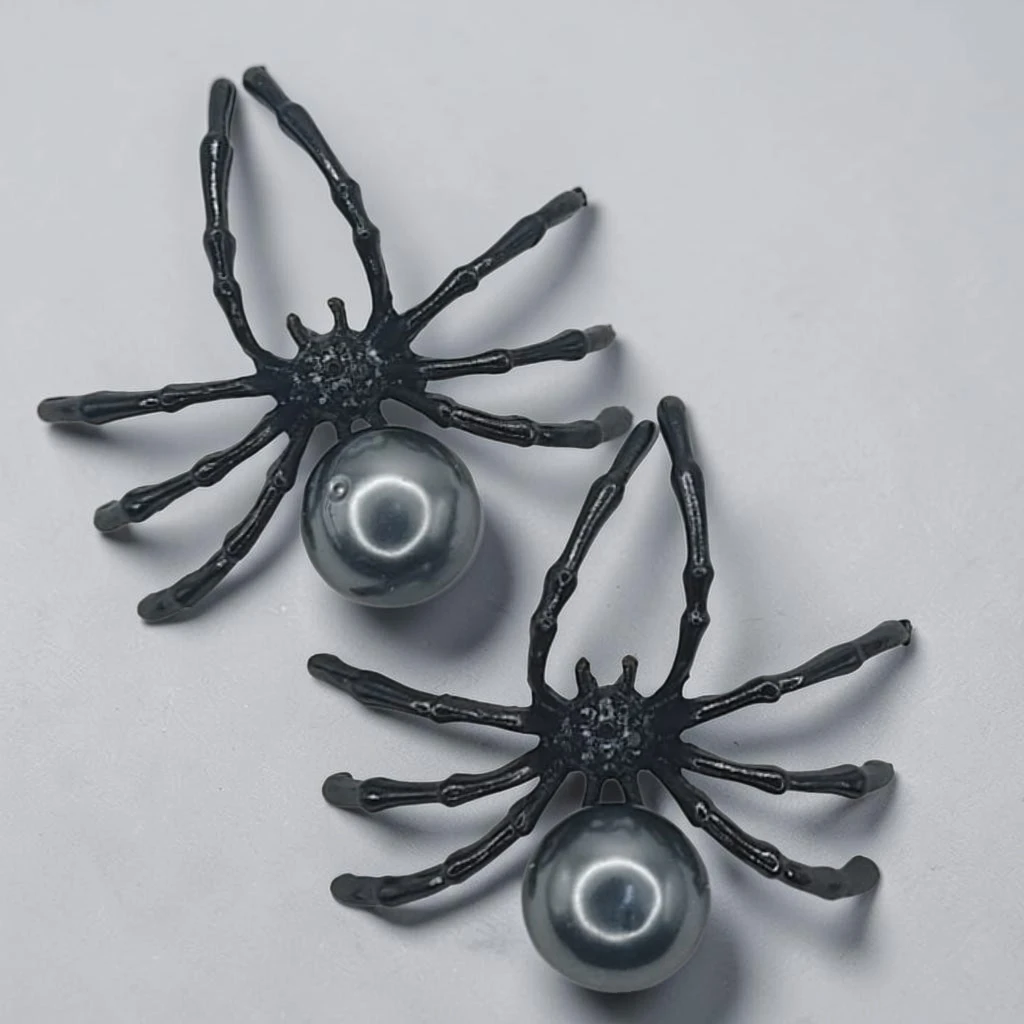 WhatsApp Image 2026-07-09 at 1.57.06 PM (3) aretes de arañas maxi con perla gris - Image 1