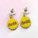 aretes con diseño tapa amarilla refresco