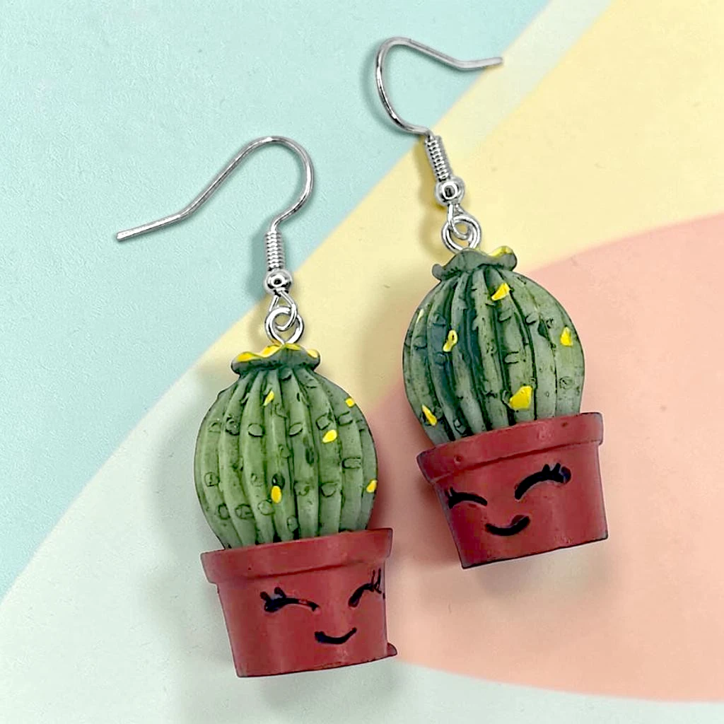 WhatsApp Image 2026-07-09 at 1.57.08 PM (6) aretes con diseño de cactus en maceta - Image 1