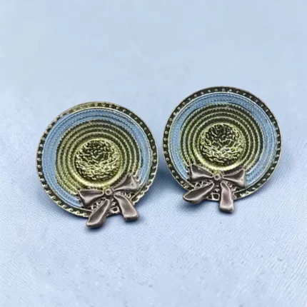 aretes de acero inoxidable sombrero con moño tri color