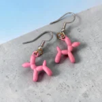 aretes de diseño globo de perro rosa