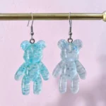 aretes de diseño de oso azul transparente