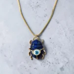 collar de acero inoxidable escarabajo de ojo azul