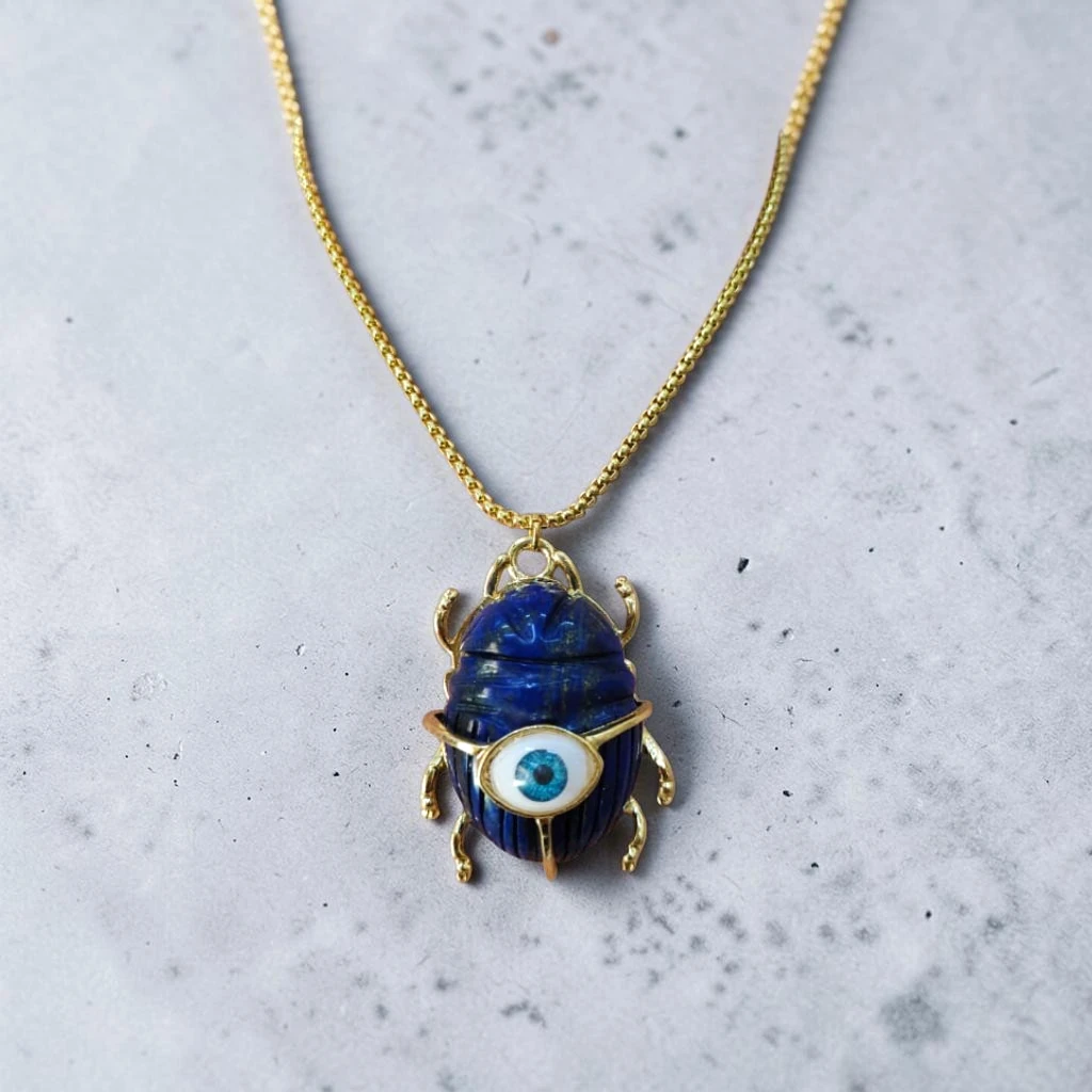 WhatsApp Image 2026-08-11 at 2.27.55 PM collar de acero inoxidable escarabajo de ojo azul - Imagen 1