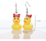Aretes Pendientes Pato Con Moño Pestañas Bisuteria - Imagen 2