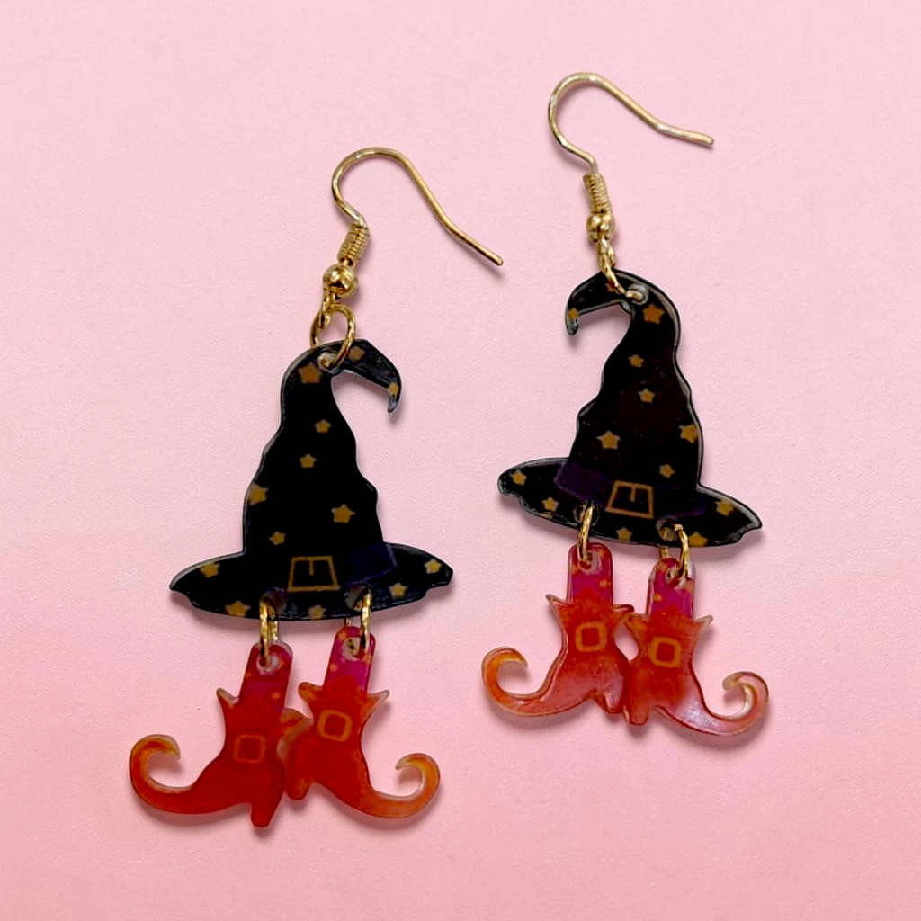 WhatsApp Image 2026-09-10 at 3.35.22 PM (1) (1) aretes de halloween sombrero y botas de bruja - Imagen 1