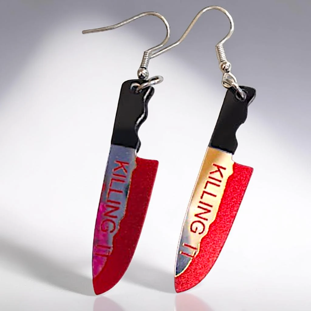 WhatsApp Image 2026-09-10 at 3.35.22 PM (10) aretes de halloween cuchillo killgin - Imagen 1