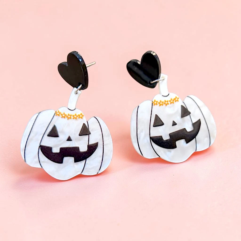 WhatsApp Image 2026-09-10 at 3.35.23 PM (18) aretes de halloween calabaza blanca - Imagen 1