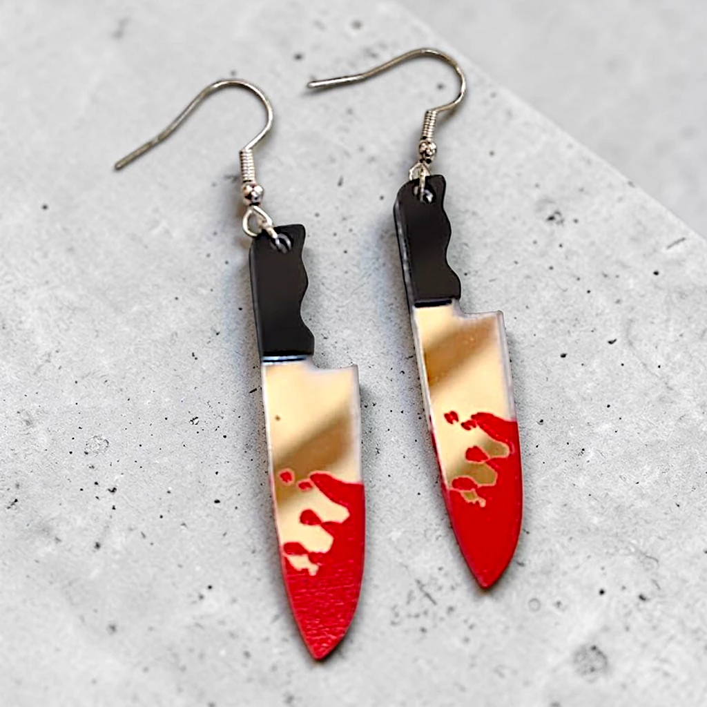 WhatsApp Image 2026-09-10 at 3.35.23 PM (23) aretes de halloween de cuchillo con sangre - Imagen 1