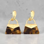 aretes de diseño bolsa de metal café