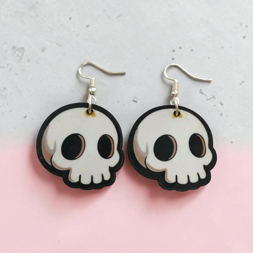 WhatsApp Image 2026-10-06 at 3.54.14 PM (1) aretes de halloween craneo calaverita - Imagen 1