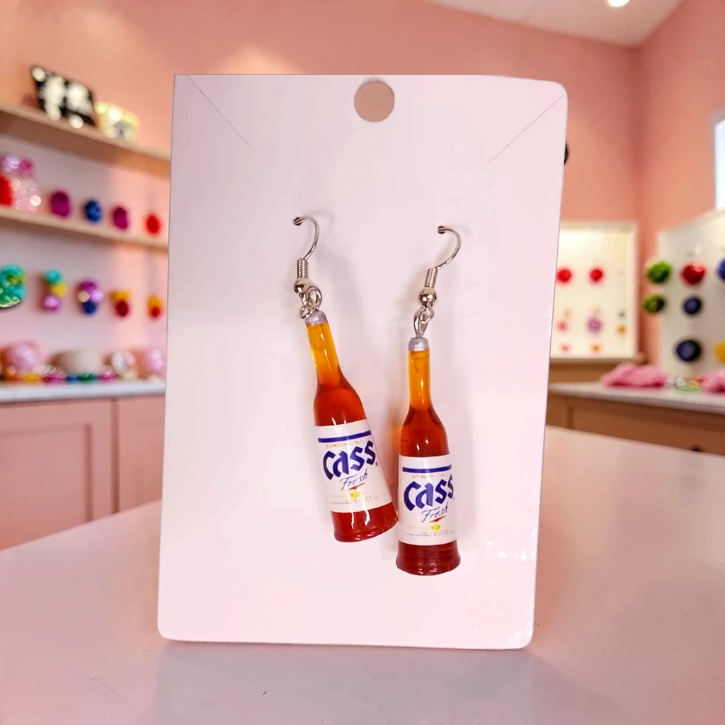 WhatsApp Image 2026-10-10 at 8.13.08 PM ARETES DE BOTELLA CAFÉ CASS - Imagen 1