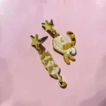 ARETES GATO CON BOLSA