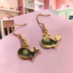 ARETES BALLENA GRIS