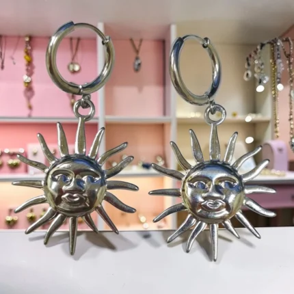 ARETES DE ACERO INOXIDABLE COLGANTES SOL PLATEADO