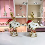ARETES DE PERRITO BLANCO Y NEGRO SANTA CLAUS