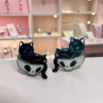 ARETES DE GATO EN CRANEO