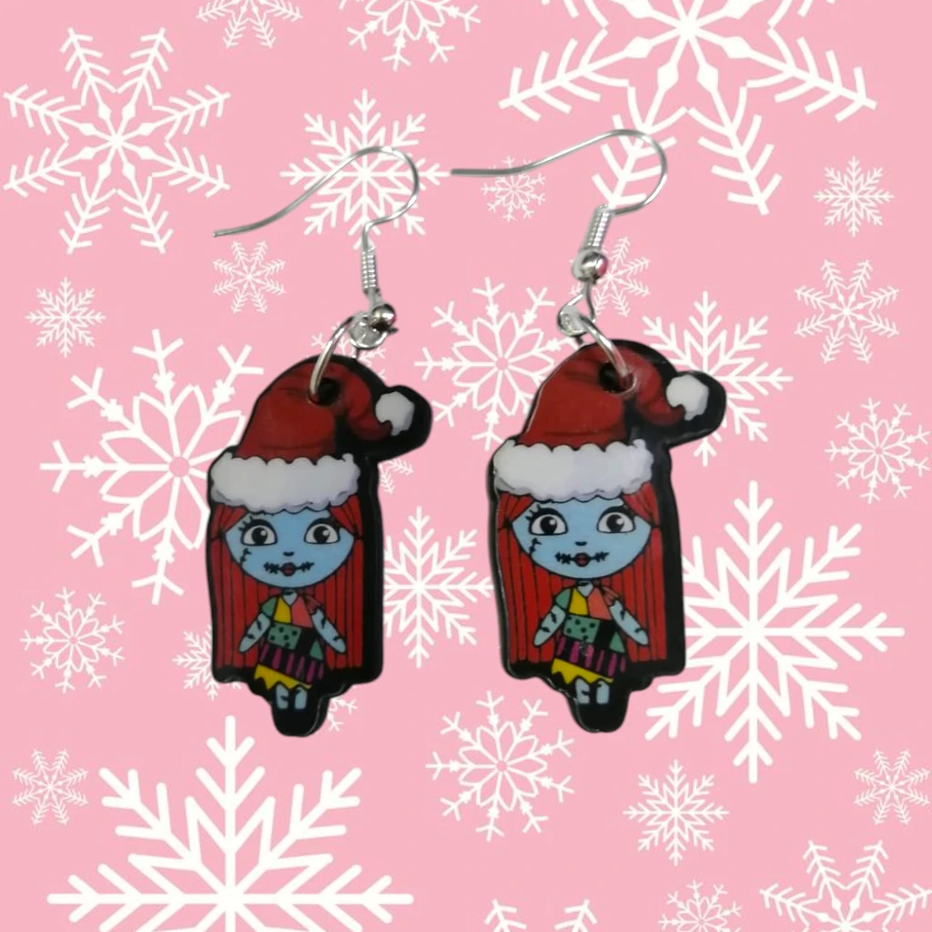WhatsApp Image 2026-10-26 at 11.45.25 AM ARETES DE NAVIDAD REINA HALLOWEEN GORRO DE SANTA - Imagen 1