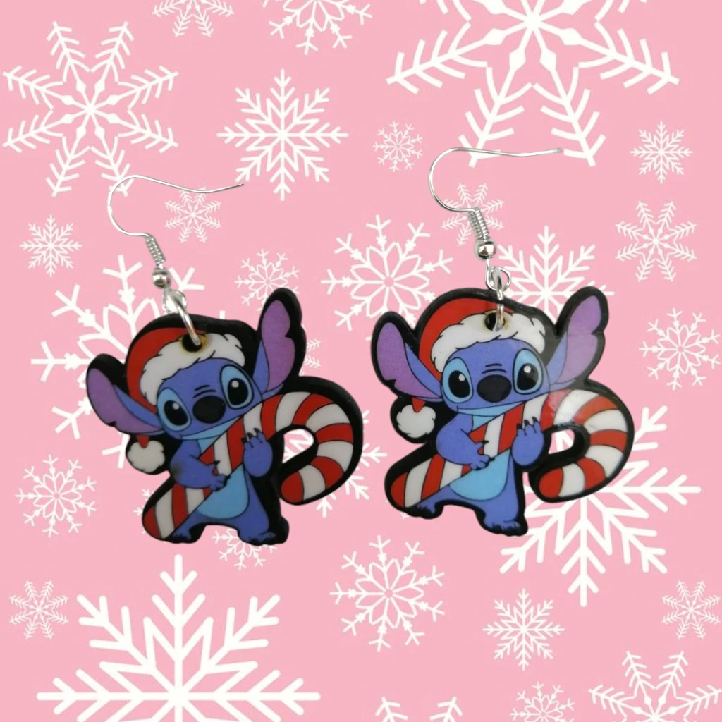 WhatsApp Image 2026-10-26 at 11.45.27 AM (1) ARETES DE NAVIDAD EXTRATERRESTRE AZUL BASTON NAVIDEÑO - Imagen 1