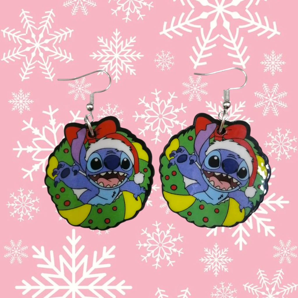 WhatsApp Image 2026-10-26 at 11.45.28 AM ARETES DE NAVIDAD EXTRATERRESTRE AZUL CORONA NAVIDEÑA - Imagen 1